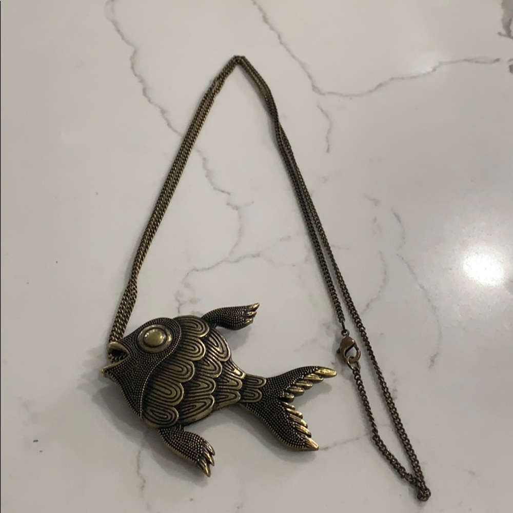 Gold tone fish necklace